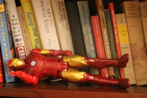 Iron Man takes a siesta on my bookshelf.
